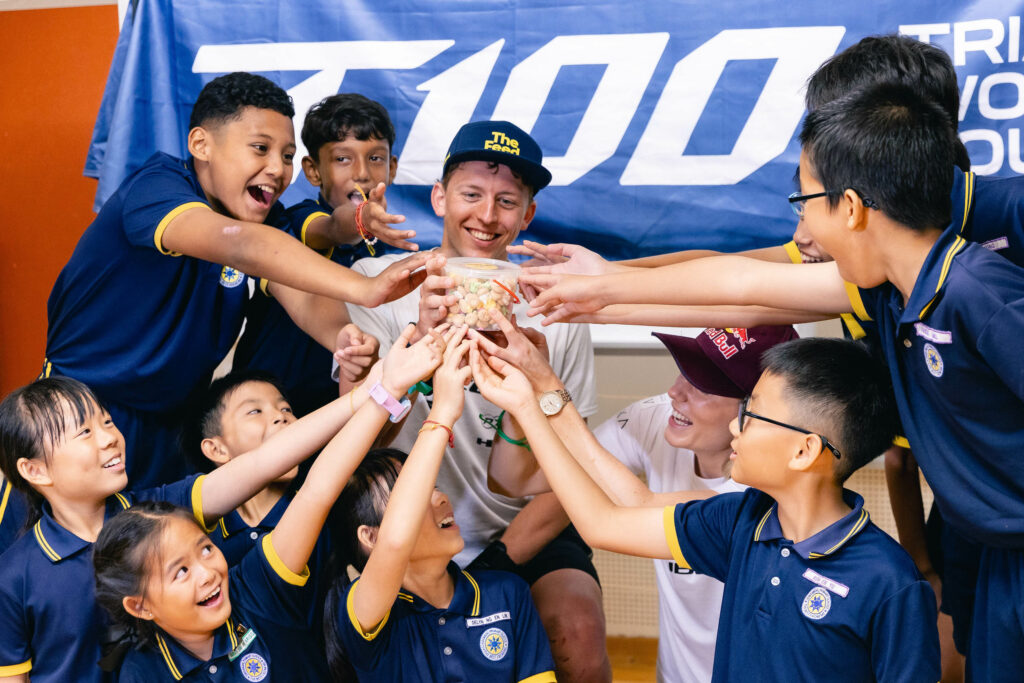T100 stars Lucy Charles-Barclay and Magnus Ditlev visit primary school in Singapore